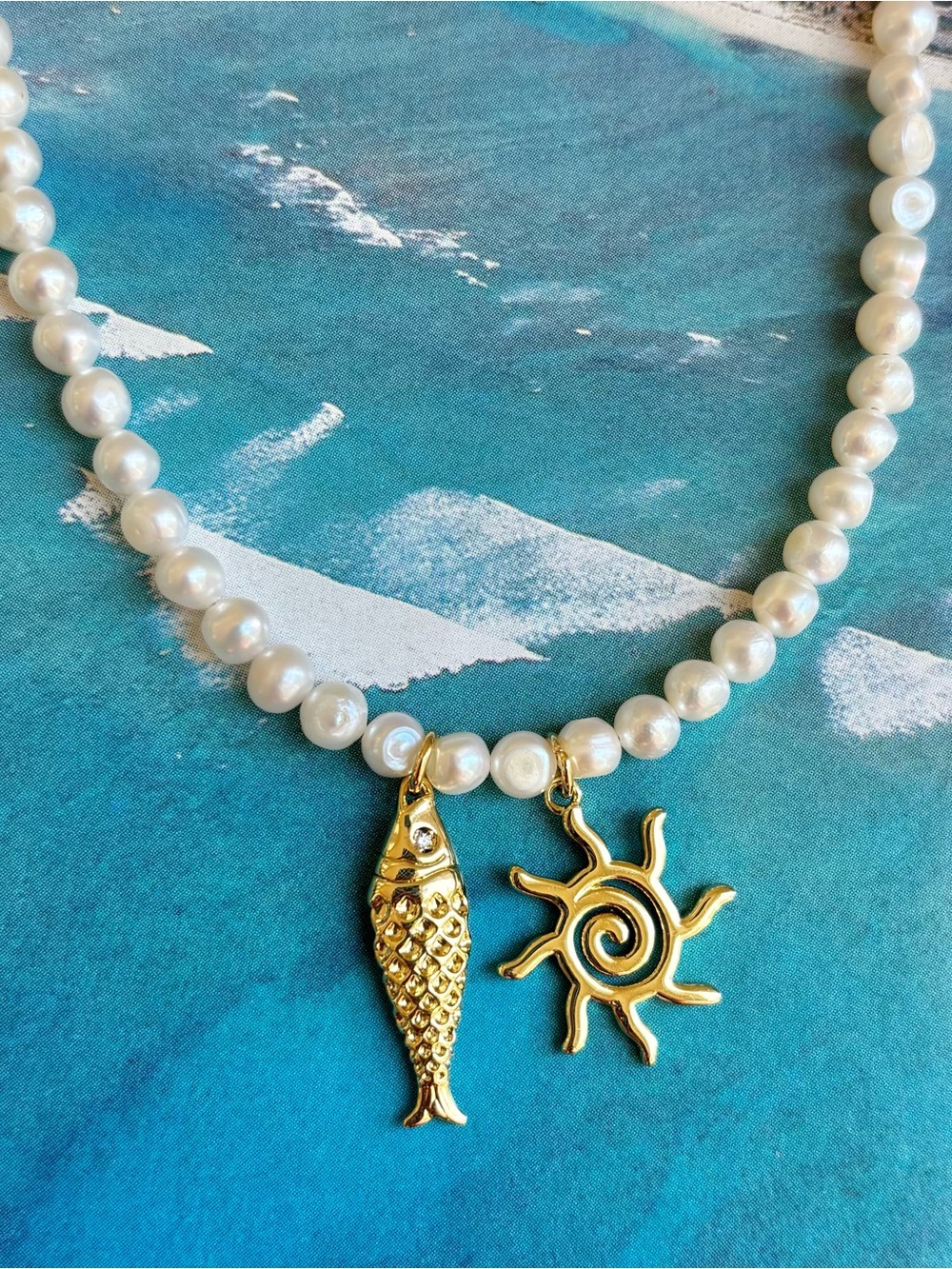 Freshwater Pearl Necklace with Fish and Sun Charms